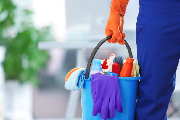 Cleaning supplies in a bucket