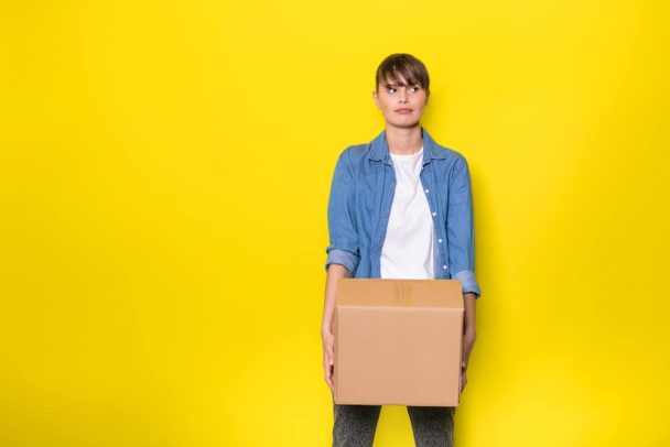 Woman holding moving box